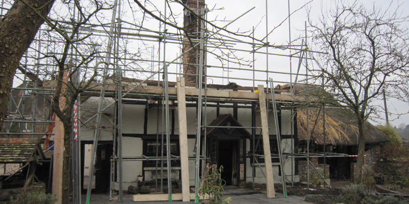 rebuilding fire damaged thatched cottage